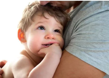 Parent and baby at an infant dental visit
